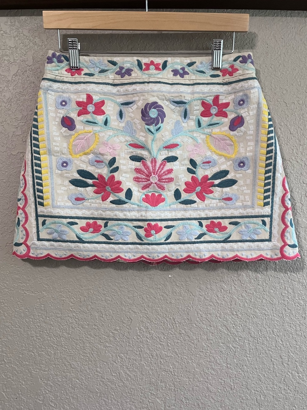 Embroidered White Mini Skirt with Multicolor Floral Design - Picture 3 of 11